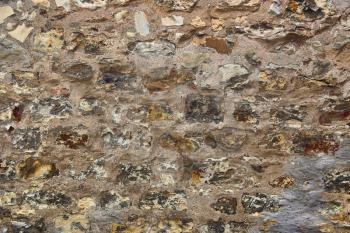 Close-up of ancient stone wall background, architectural texture