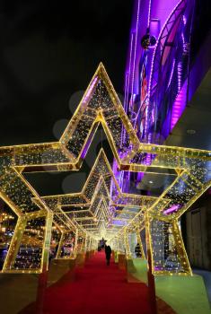 New Year and Christmas decoration in the Moscow streets. Star passage made of garlands.