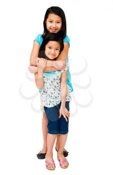 Royalty Free Photo of a Two Girls Hugging