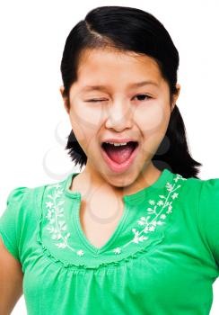 Royalty Free Photo of a Young Girl Winking