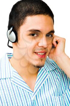 Royalty Free Photo of a Man Listening to Music with Headphones