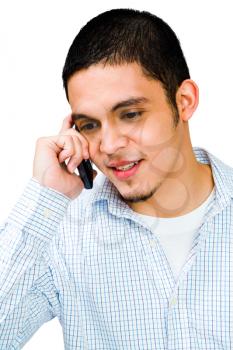 Royalty Free Photo of a Young Man Talking on a Cell Phone