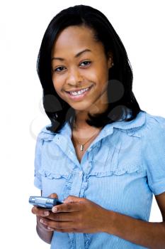 Royalty Free Photo of a Young Girl Holding a Cell Phone
