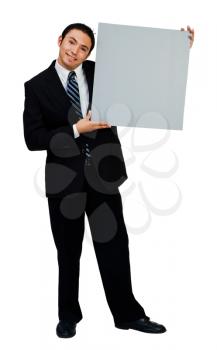 Royalty Free Photo of a Businessman Holding a Blank Placard