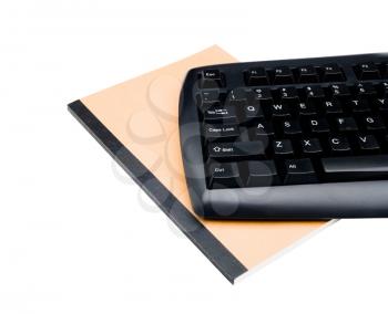 Royalty Free Photo of a Computer Keyboard with a Folder