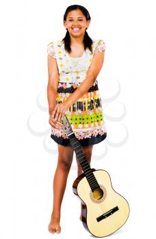 Royalty Free Photo of a Teenage Girl with a Guitar