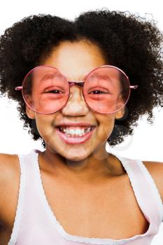 Royalty Free Photo of a Young Girl Wearing Large Glasses