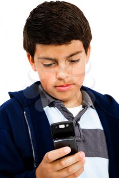 Royalty Free Photo of a Teenage Boy Texting on his Cellular Phone