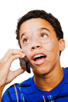 Royalty Free Photo of a Teenage Boy Talking on a Cellular Phone