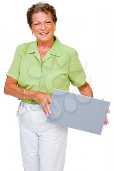 Royalty Free Photo of a Woman Smiling and Holding a Blank Placard
