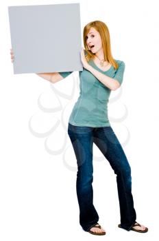 Royalty Free Photo of a Woman Holding a Blank Placard