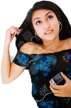 Royalty Free Photo of a Woman Listening to an Mp3 Player
