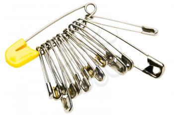 Royalty Free Photo of Safety Pins Hooked on a Diaper Pin