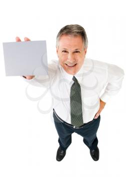 Royalty Free Photo of a Businessman Holding up a Blank Placard