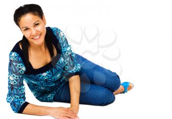 Royalty Free Photo of a Woman Leaning on the Floor Smiling