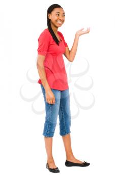 Royalty Free Photo of a Woman Smiling and Using a Hand Gesture