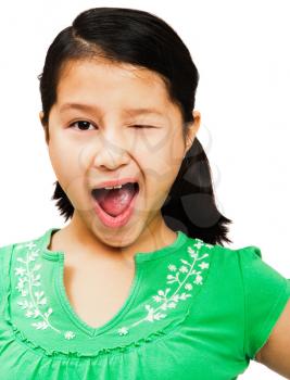 Royalty Free Photo of a Young Girl Winking