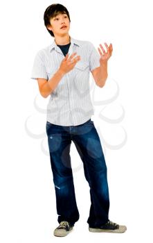 Royalty Free Photo of a Teenage Boy Doing Gestures with his Hands