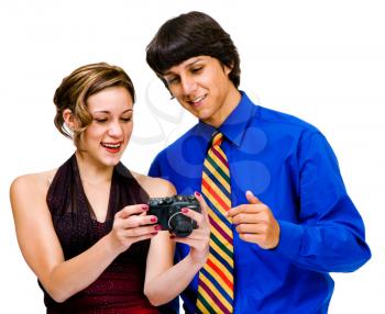 Royalty Free Photo of a Brother and Sister Looking at a Camera