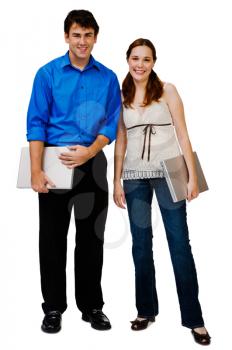 Royalty Free Photo of a Male and Female Standing and Holding Laptops