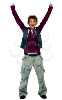 Royalty Free Photo of a Woman Smiling with her Arms in the air
