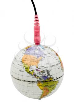 Royalty Free Photo of a Globe with Cable Plugged in the Top