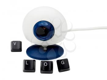 Royalty Free Photo of a Webcam with the Word Vlog in Computer Keys