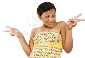 Royalty Free Photo of a young Woman Doing Hand Gestures