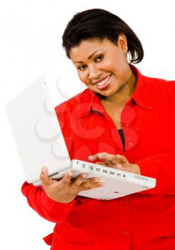 Royalty Free Photo of a Woman Holding a Laptop 