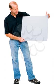 Royalty Free Photo of a Man Holding a Blank Placard