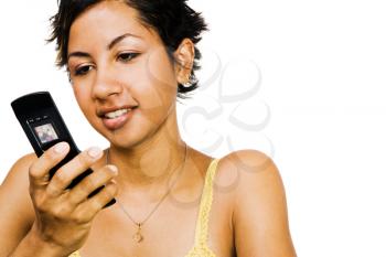 Royalty Free Photo of a Woman Text Message on her Mobile Phone