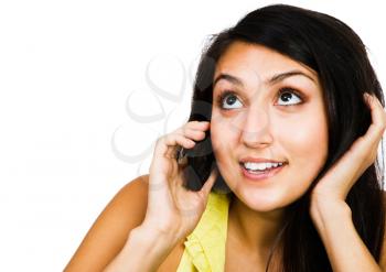 Royalty Free Photo of a Young Woman Talking on a Mobile Phone