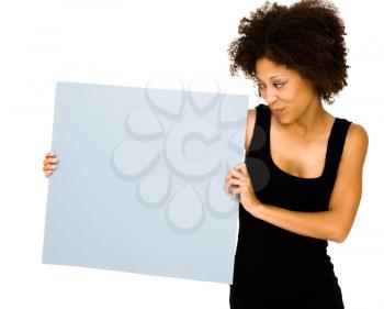 Royalty Free Photo of a Woman Showing a Blank Placard