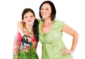 Royalty Free Photo of a Woman Holding a Camera with her arm Around a Young Girl