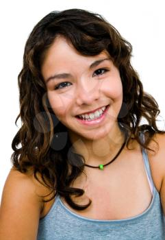 Close-up of a teenage girl smiling and posing isolated over white