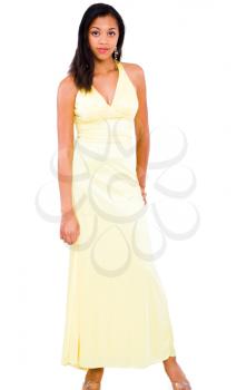 Portrait of a teenage girl standing isolated over white