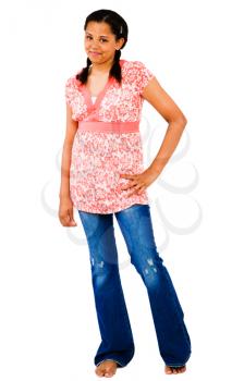 Teenage girl standing with her hand on her hip isolated over white