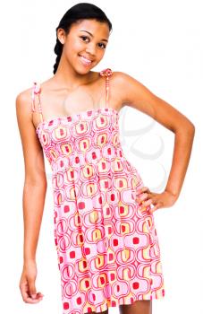 Teenage girl posing with hand on hip isolated over white