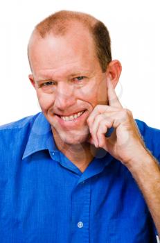 Happy mature man thinking isolated over white