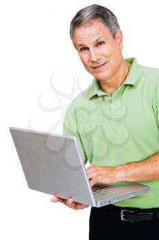 Portrait of a man working on a laptop isolated over white