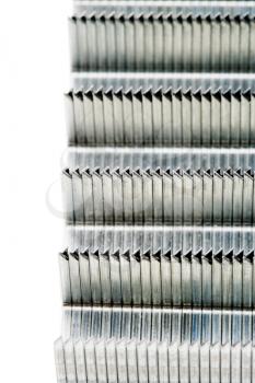 Close-up of staple pins isolated over white