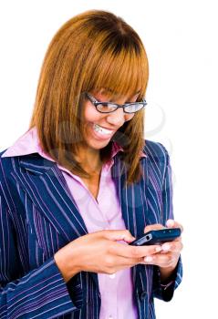 Woman text messaging with a mobile phone isolated over white
