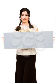 Portrait of a woman holding a placard and posing isolated over white