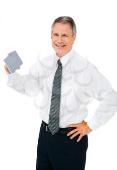 Happy businessman holding a placard isolated over white