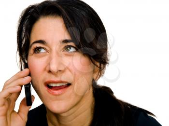 Mature woman talking on a mobile phone isolated over white