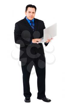 Latin American businessman using a laptop isolated over white