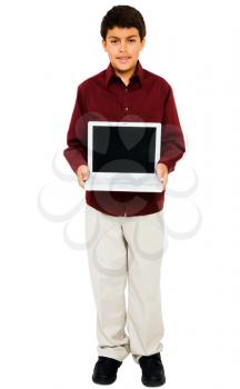 Child showing a laptop isolated over white