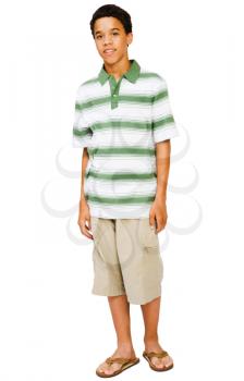 Portrait of a teenage boy posing isolated over white