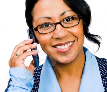 Happy businesswoman talking on a mobile phone isolated over white