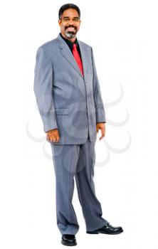 Businessman posing and smiling isolated over white